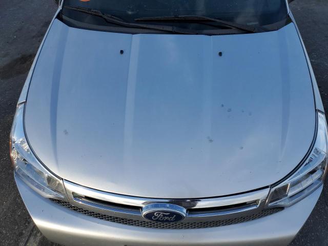 Photo 11 from auction – 2011 FORD FOCUS SE with VIN 1FAHP3FN3BW153030