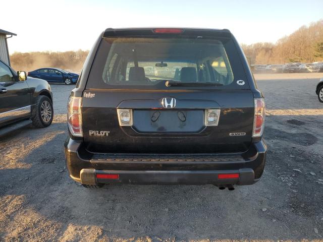 Photo 6 from auction – 2006 HONDA PILOT LX with VIN 2HKYF181X6H552976