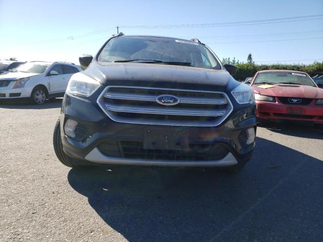 Photo 5 from auction – 2018 FORD ESCAPE SE with VIN 1FMCU0GD5JUA35553