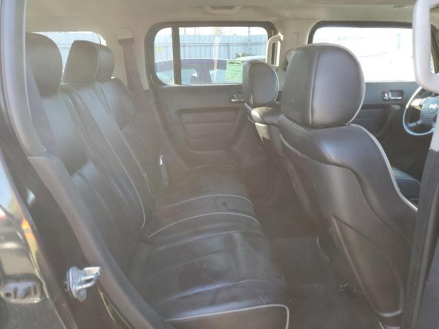 Photo 11 from auction – 2006 HUMMER H3 with VIN 5GTDN136168322688