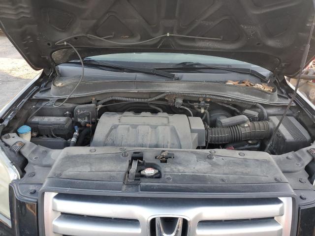 Photo 12 from auction – 2006 HONDA PILOT LX with VIN 2HKYF181X6H552976