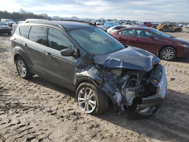 FORD ESCAPE SE 2018 with VIN 1FMCU9GDXJUC13249 - Photo from auction