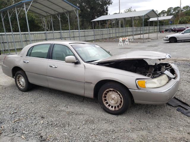 Photo 4 from auction – 1999 LINCOLN TOWN CAR E with VIN 1LNHM81W6XY628192