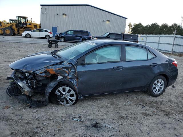 TOYOTA COROLLA L 2016 with VIN 5YFBURHE9GP372888 - Photo from auction