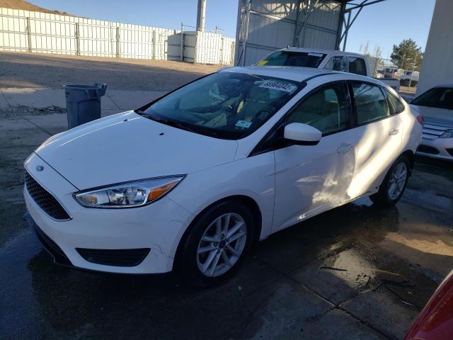 FORD FOCUS SE 2018 with VIN 1FADP3F22JL280890 - Photo from auction