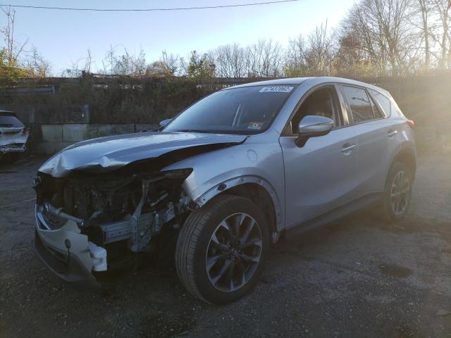 MAZDA CX-5 GT 2016 with VIN JM3KE4DY2G0773071 - Photo from auction