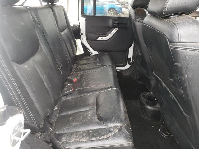 Photo 11 from auction – 2015 JEEP WRANGLER U with VIN 1C4BJWFG9FL771268