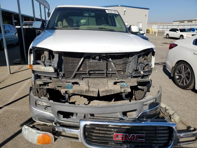 Photo 5 from auction – 2004 GMC YUKON with VIN 1GKEK13T94J310275