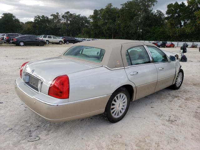 Photo 4 from auction – 2004 LINCOLN TOWN CAR E with VIN 1LNHM81W64Y687786