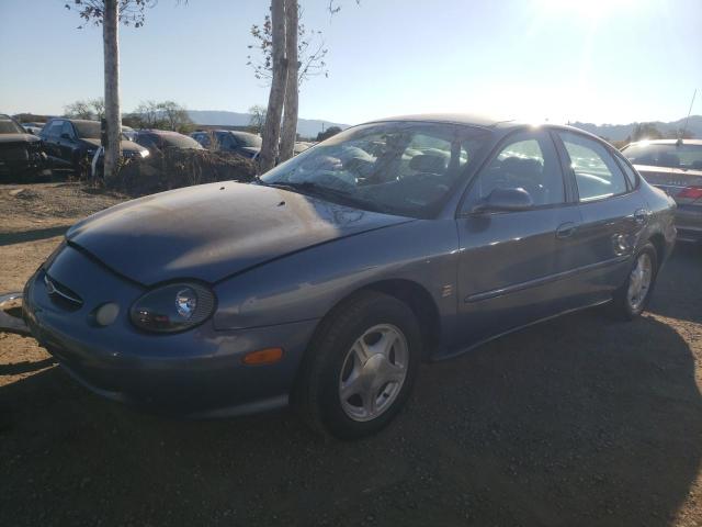 FORD TAURUS SE 1999 with VIN 1FAFP53S1XG182556 - Photo from auction
