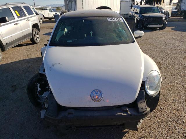 Photo 5 from auction – 2013 VOLKSWAGEN BEETLE with VIN 3VWRL7AT2DM667801