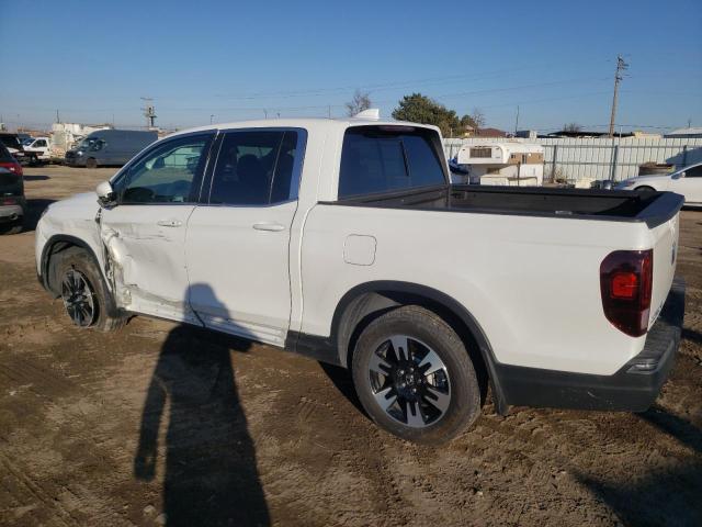 Photo 2 from auction – 2020 HONDA RIDGELINE with VIN 5FPYK3F55LB030514