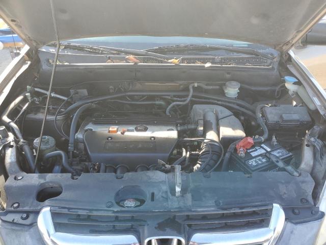 Photo 11 from auction – 2002 HONDA CR-V LX with VIN JHLRD68402C014877