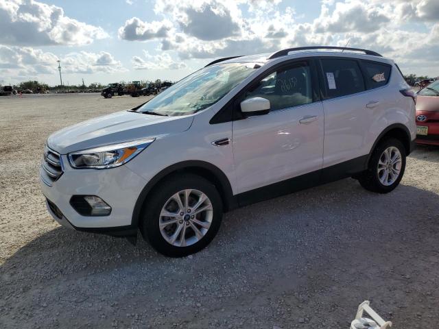 FORD ESCAPE SE 2018 with VIN 1FMCU9GD0JUD42276 - Photo from auction