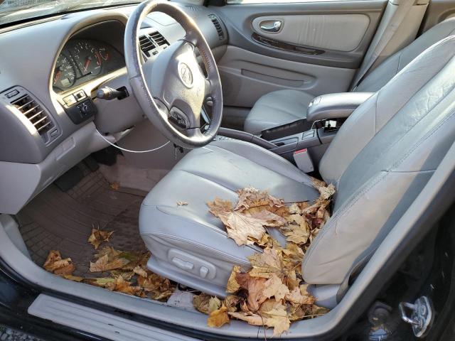 Photo 7 from auction – 2001 NISSAN MAXIMA GXE with VIN JN1CA31D01T800118