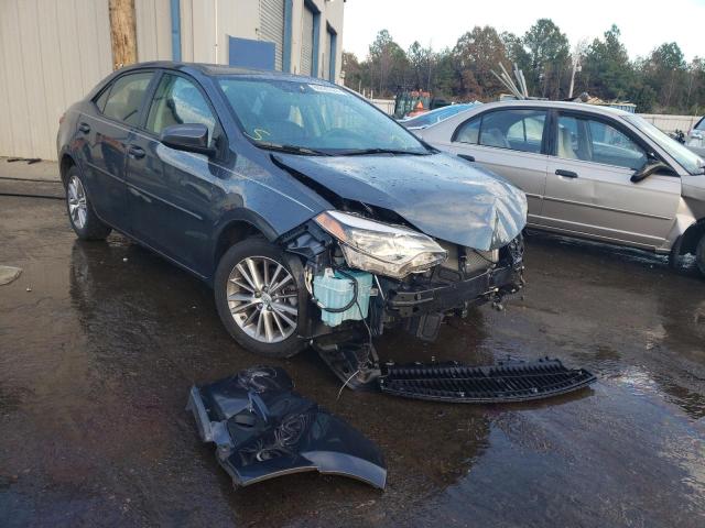 TOYOTA COROLLA L 2014 with VIN 2T1BURHE0EC033448 - Photo from auction