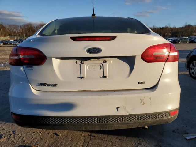 Photo 6 from auction – 2017 FORD FOCUS SE with VIN 1FADP3F2XHL275494