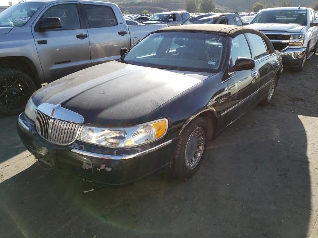 Photo 1 from auction – 2002 LINCOLN TOWN CAR with VIN 1LNHM83W42Y605290