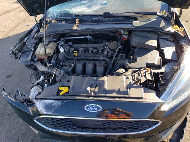Photo 11 from auction – 2015 FORD FOCUS SE with VIN 1FADP3K22FL248552