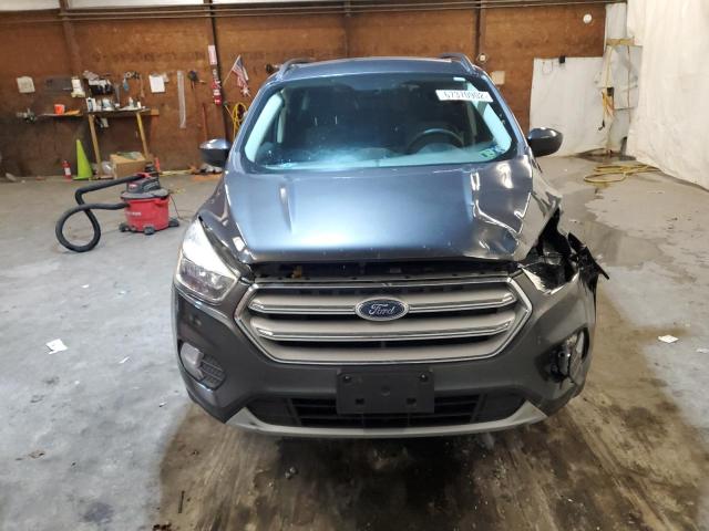 Photo 5 from auction – 2018 FORD ESCAPE SE with VIN 1FMCU9GD6JUA65410