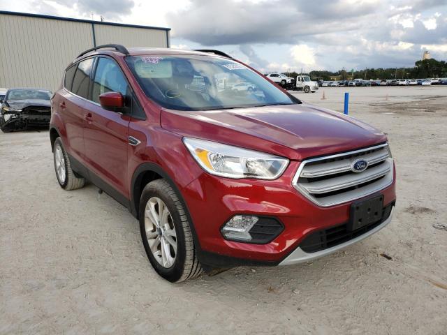 FORD ESCAPE SE 2018 with VIN 1FMCU9GD5JUB12751 - Photo from auction
