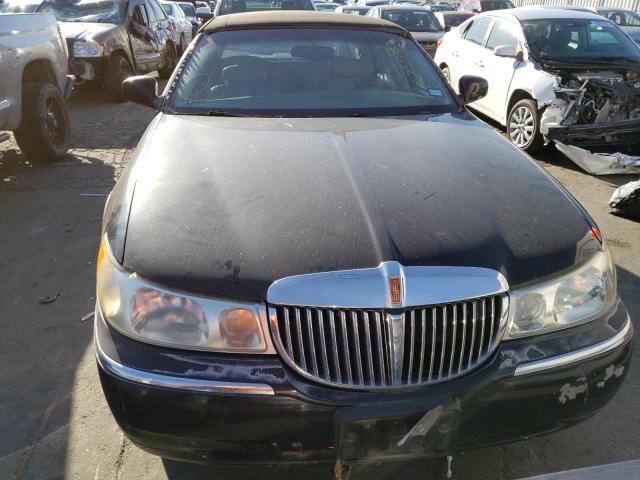 Photo 5 from auction – 2002 LINCOLN TOWN CAR with VIN 1LNHM83W42Y605290