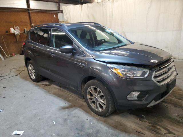 Photo 4 from auction – 2018 FORD ESCAPE SE with VIN 1FMCU9GD6JUA65410