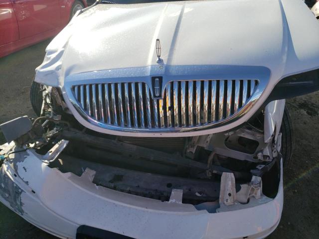 Photo 11 from auction – 2004 LINCOLN TOWN CAR E with VIN 1LNHM81W64Y649474
