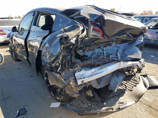 Photo 2 from auction – 2021 TESLA MODEL Y with VIN 5YJYGDEE0MF159134