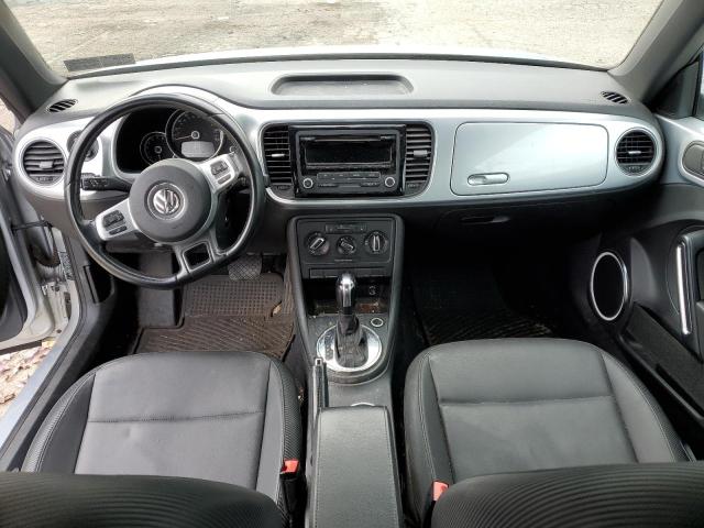 Photo 8 from auction – 2014 VOLKSWAGEN BEETLE with VIN 3VWJP7AT0EM621970