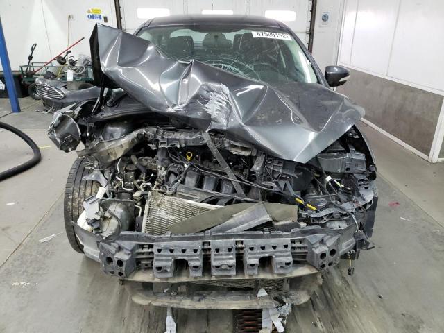 Photo 11 from auction – 2016 FORD FOCUS TITA with VIN 1FADP3J28GL216241