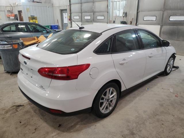 Photo 3 from auction – 2016 FORD FOCUS SE with VIN 1FADP3F27GL253595