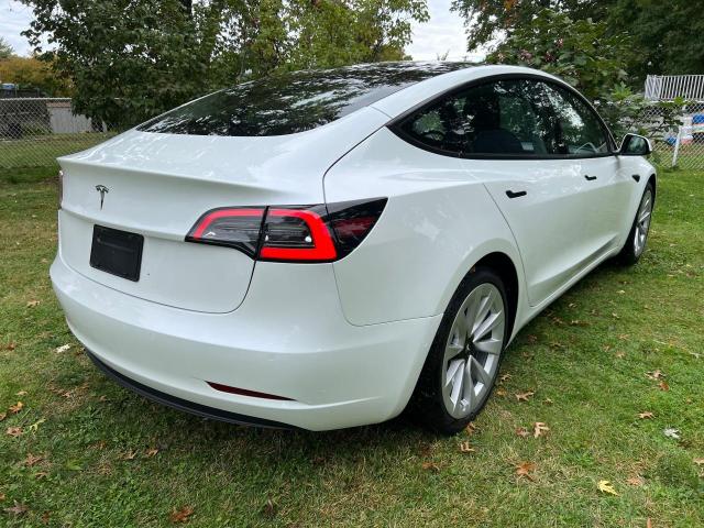 Photo 4 from auction – 2022 TESLA MODEL 3 with VIN 5YJ3E1EA9NF188676