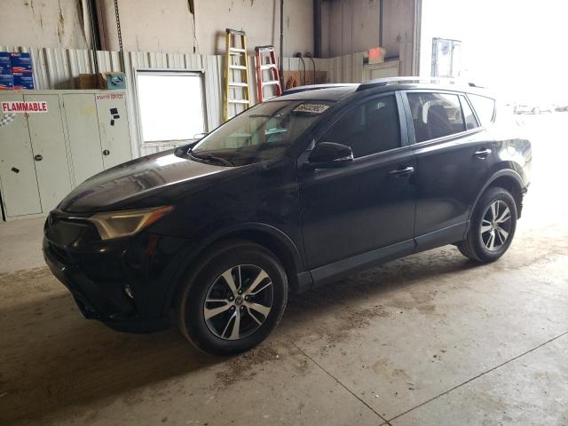 TOYOTA RAV4 XLE 2017 with VIN 2T3RFREV7HW580451 - Photo from auction
