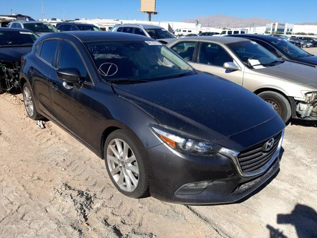 MAZDA 3 TOURING 2017 with VIN JM1BN1L39H1147963 - Photo from auction