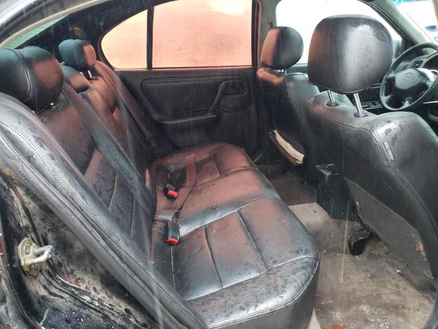 Photo 10 from auction – 1999 INFINITI G20 with VIN JNKCP11A5XT018393