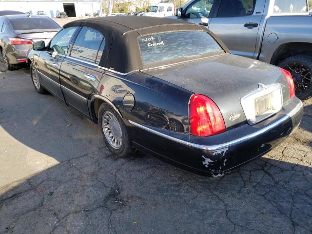 Photo 2 from auction – 2002 LINCOLN TOWN CAR with VIN 1LNHM83W42Y605290