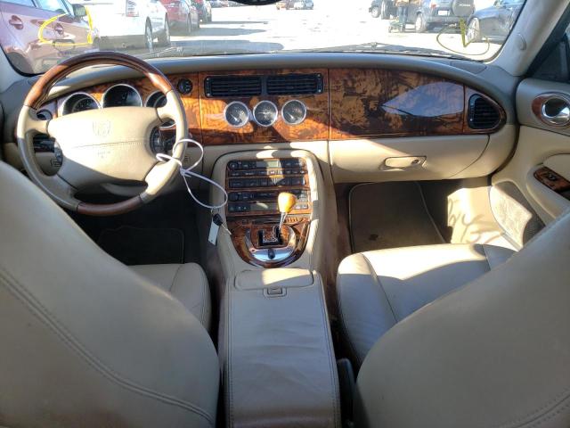 Photo 8 from auction – 2004 JAGUAR XK8 with VIN SAJDA42C242A39961