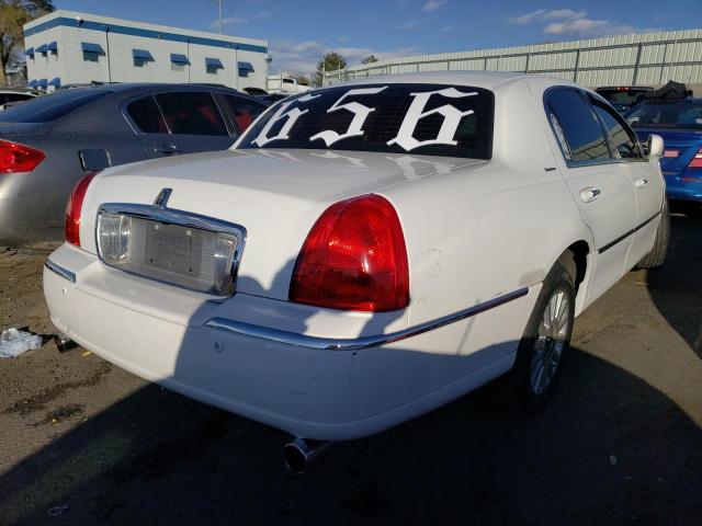 Photo 3 from auction – 2004 LINCOLN TOWN CAR E with VIN 1LNHM81W64Y649474
