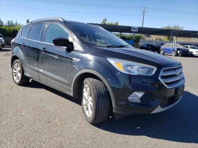 Photo 4 from auction – 2018 FORD ESCAPE SE with VIN 1FMCU0GD5JUA35553