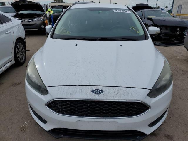 Photo 5 from auction – 2015 FORD FOCUS SE with VIN 1FADP3K28FL318507