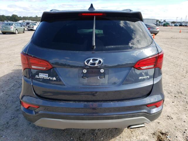 Photo 6 from auction – 2018 HYUNDAI SANTA FE S with VIN 5NMZU3LB0JH097275