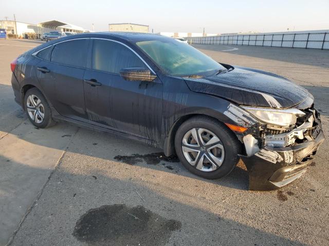Photo 4 from auction – 2018 HONDA CIVIC LX with VIN 19XFC2F56JE201216