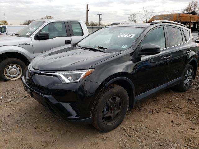 TOYOTA RAV4 LE 2018 with VIN 2T3BFREV1JW728259 - Photo from auction