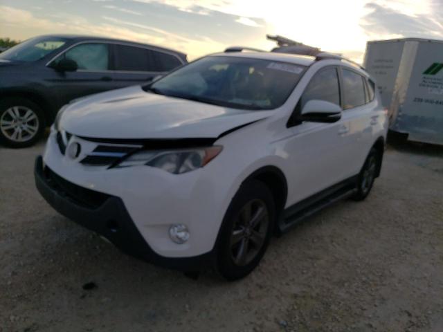 TOYOTA RAV4 XLE 2015 with VIN JTMWFREV6FJ049059 - Photo from auction