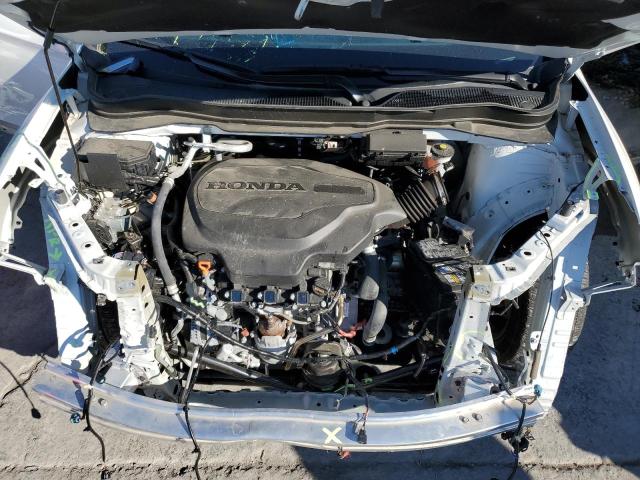 Photo 12 from auction – 2022 HONDA PILOT SE with VIN 5FNYF5H27NB008951