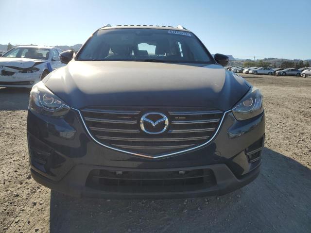 Photo 5 from auction – 2016 MAZDA CX-5 GT with VIN JM3KE4DY6G0663642
