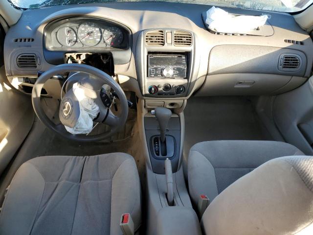 Photo 8 from auction – 2002 MAZDA PROTEGE DX with VIN JM1BJ226X21560933