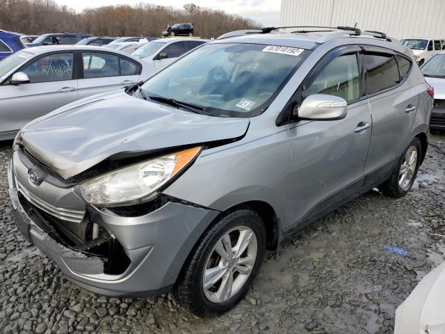 HYUNDAI TUCSON GLS 2012 with VIN KM8JUCAC7CU417658 - Photo from auction