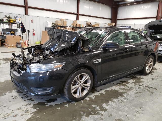 FORD TAURUS SEL 2014 with VIN 1FAHP2E8XEG187101 - Photo from auction